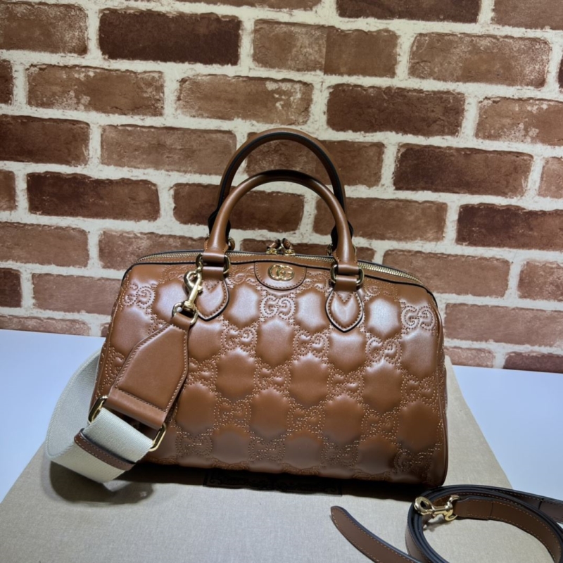 G*u*i top handle bags
